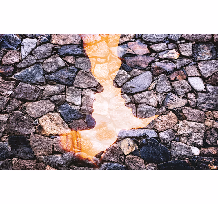 Fototapete abstrakt mit silhouettierten steinfaces - TenStickers