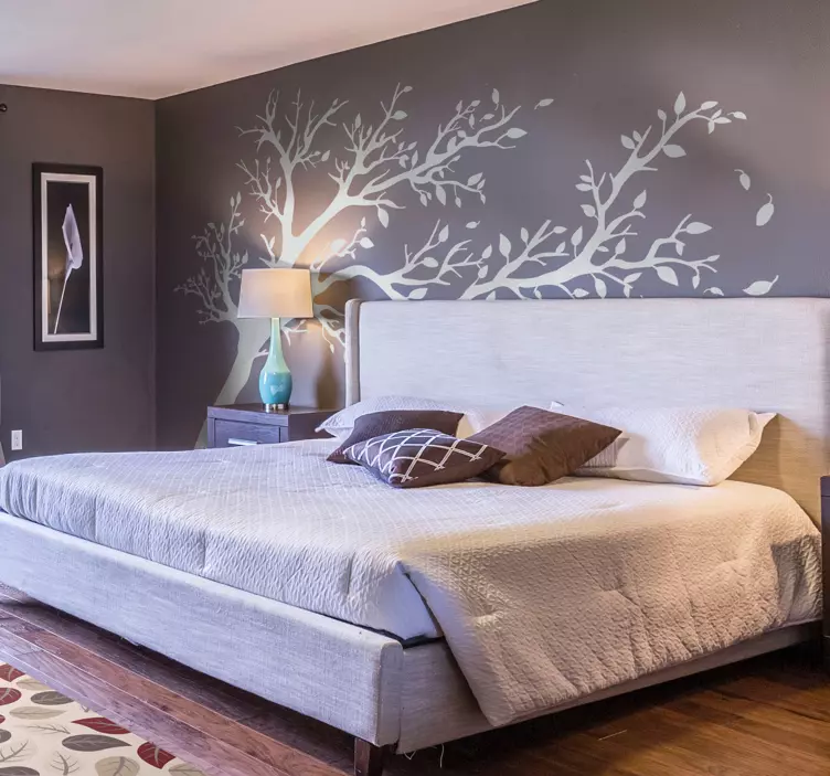 Wandtattoo Wohnzimmer mit Baum im Wind - TenStickers