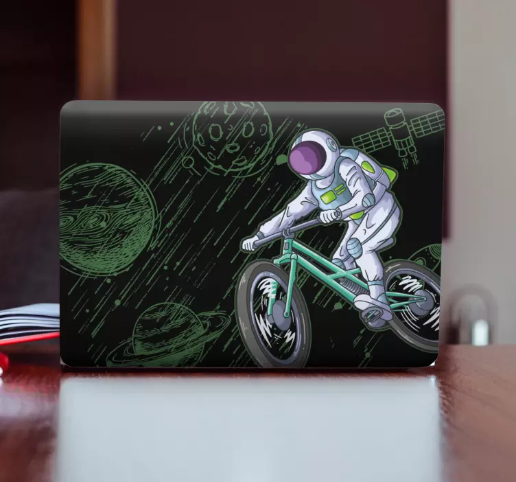 Laptop sticker astronaut auf fahrrad - TenStickers