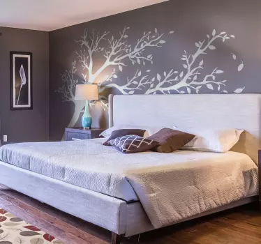 Wandtattoo Wohnzimmer mit Baum im Wind - TenStickers