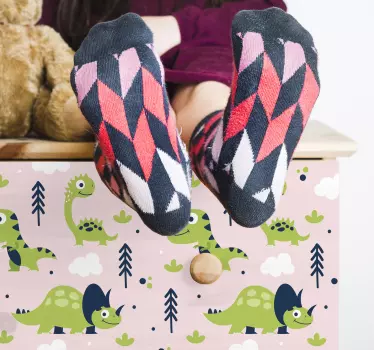 Möbelfolie Kleine grüne dinosaurier auf rosa Hintergrun - TenStickers