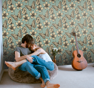 Tapete Schmetterling beige blumen auf blauem hintergrund - TenStickers